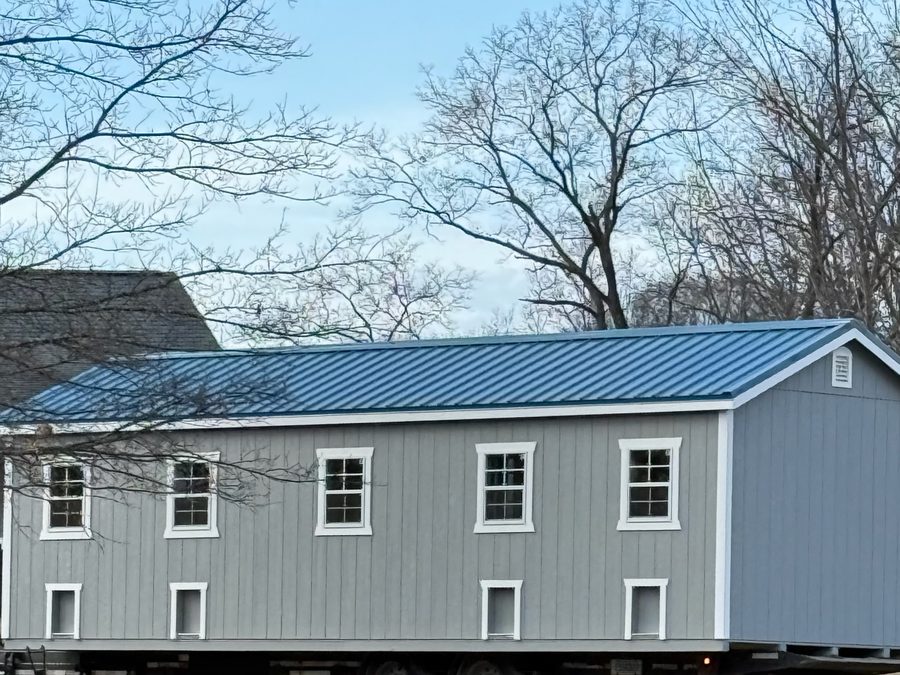 Grow-out building with blue roof